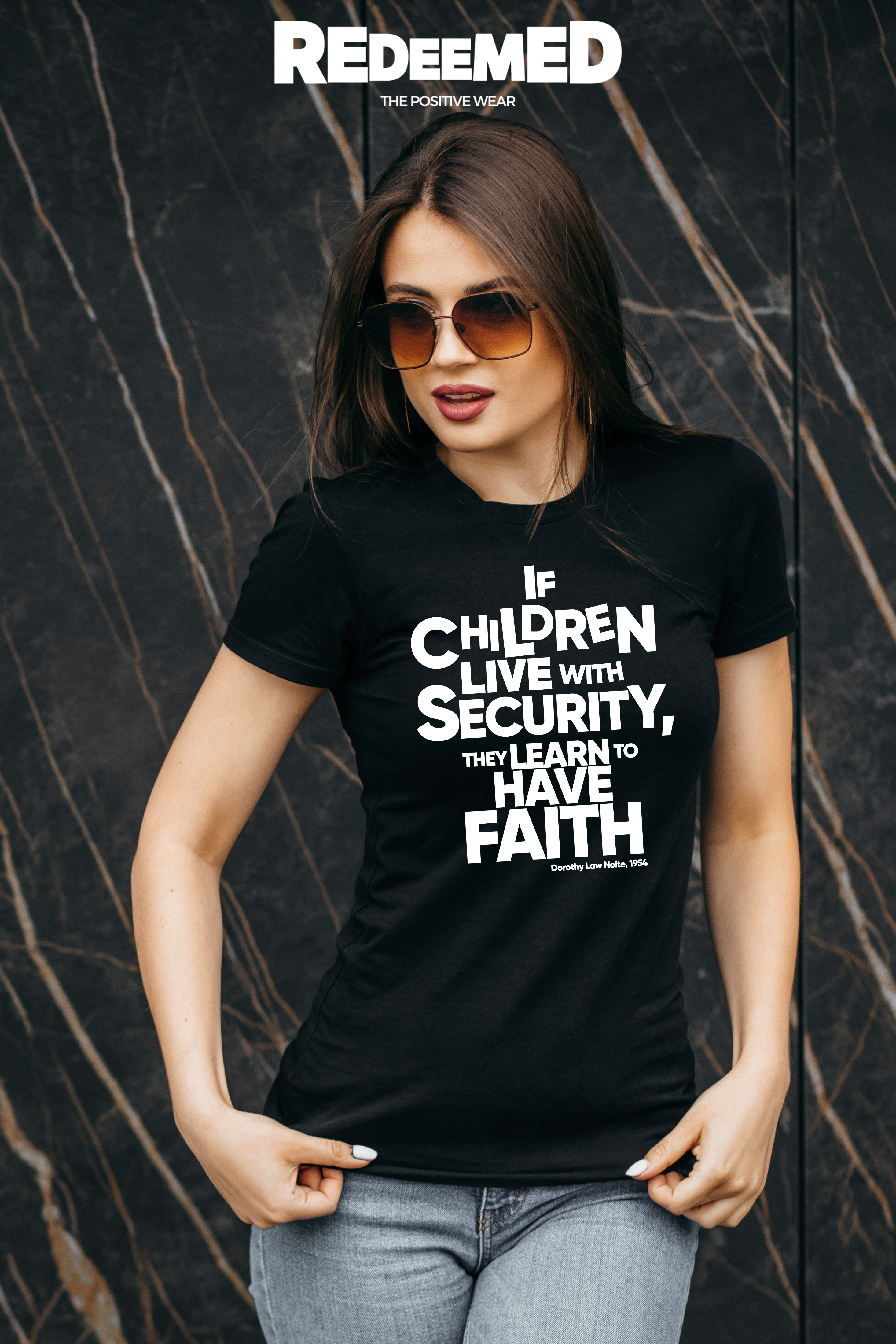 “If children live with security, they learn to have faith” – Black  (Gildan G5000) T-shirt