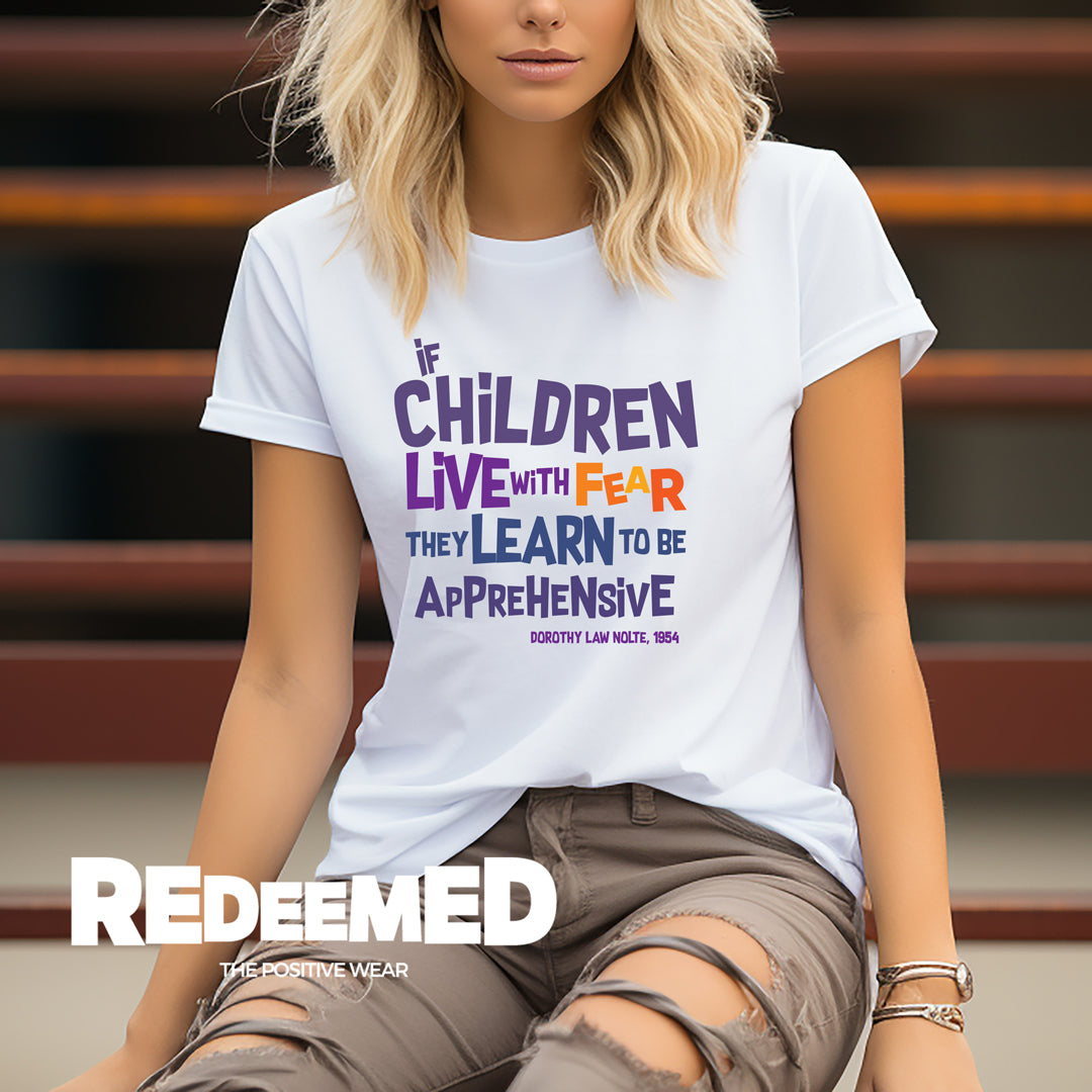“If children live with fear, they learn to be apprehensive.” – Black/White Colorful  (Bella Canvas/Gildan G5000) T-shirt