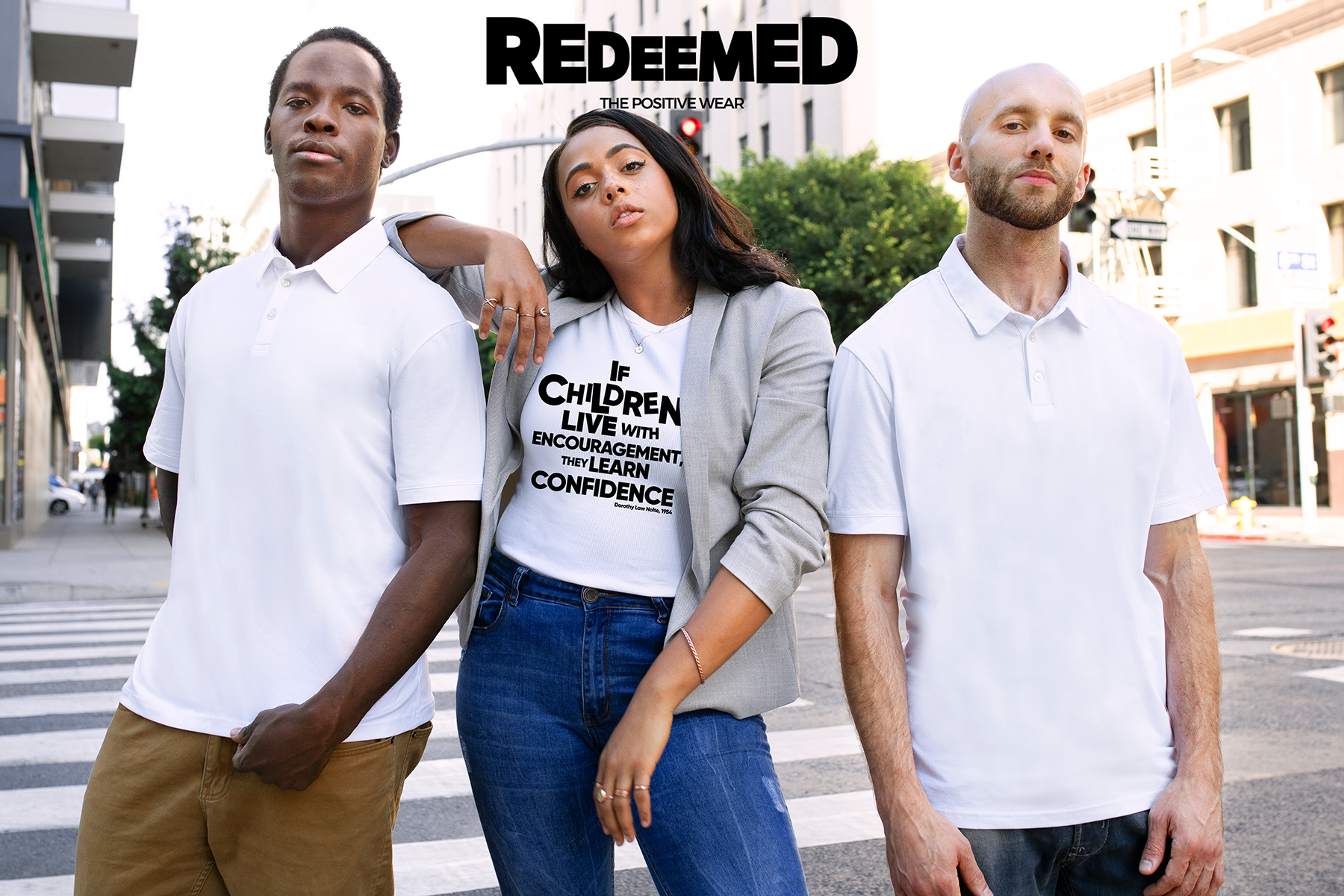 “If children live with encouragement, they learn to confidence.” – White  (Bella+Canvas) T-shirt