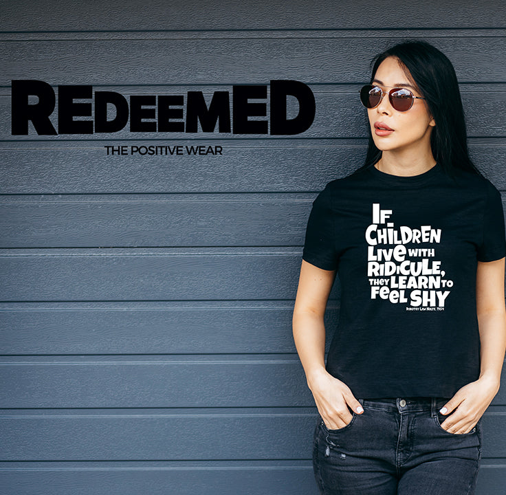 “If children live with ridicule, they learn to feel shy.” – Black  (Gildan G5000) T-shirt